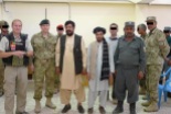 Left to right: POLAD Niels Vistisen, TFH Deputy Commander Colonel Johnny Bowren, District Governor Salim Rodi, Haji Gul's one-eyed clerk, D-COP Ghullie Khan